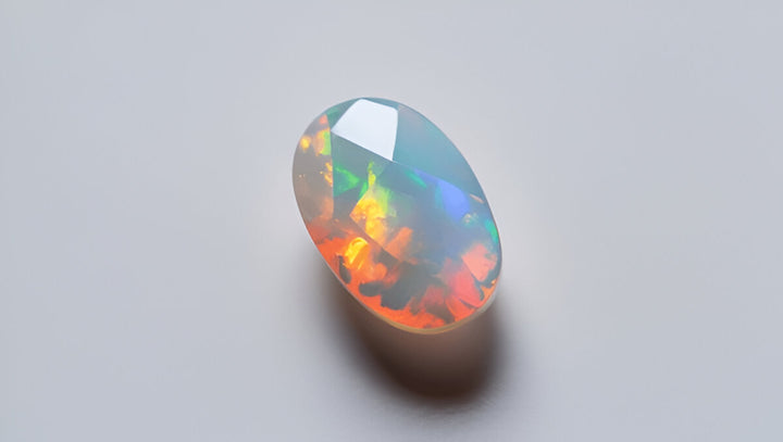 Ethiopian opal 6x10 oval checker cut Briolette 1 pcs